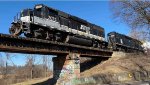 ASRY 2022 crosses a bridge just south of town.